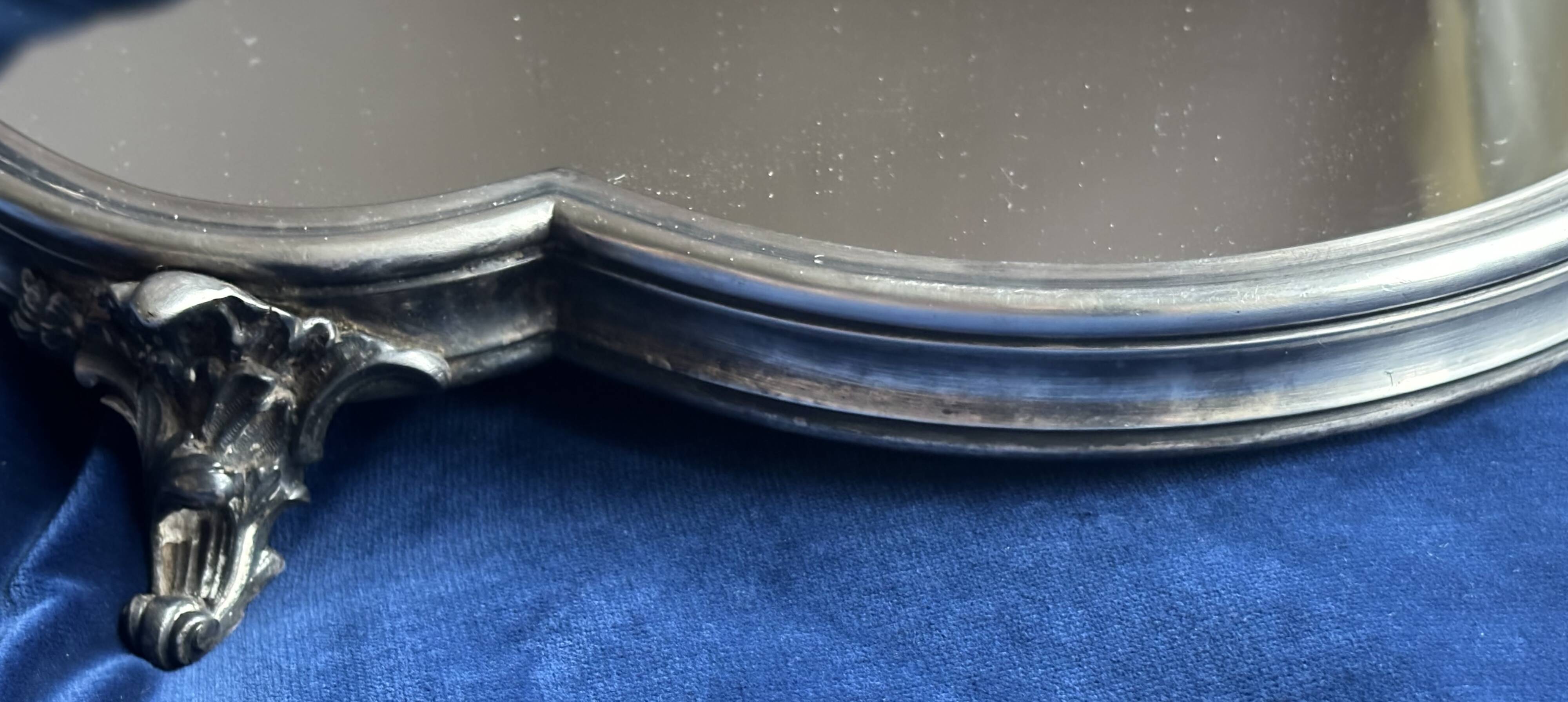 19th century mirror and silver table centrepiece