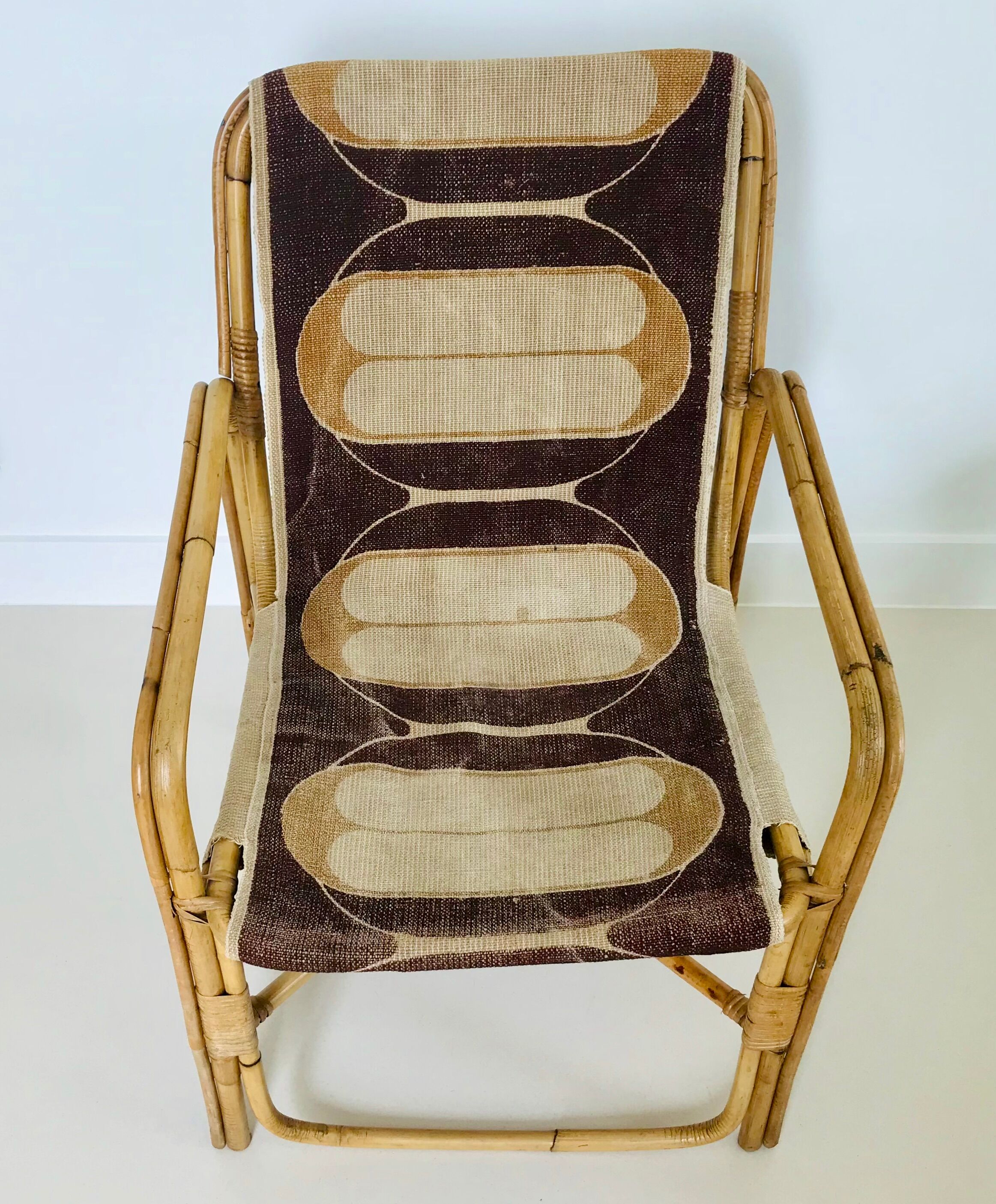 Rattan armchair and fabric, France 60s