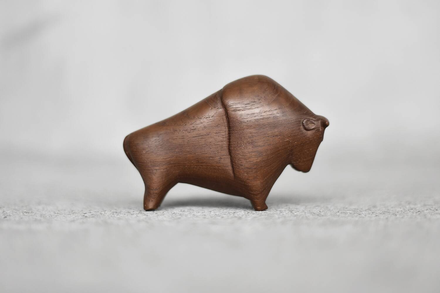 Dark teak bison figurine in mid-century modern Danish style, 1960.