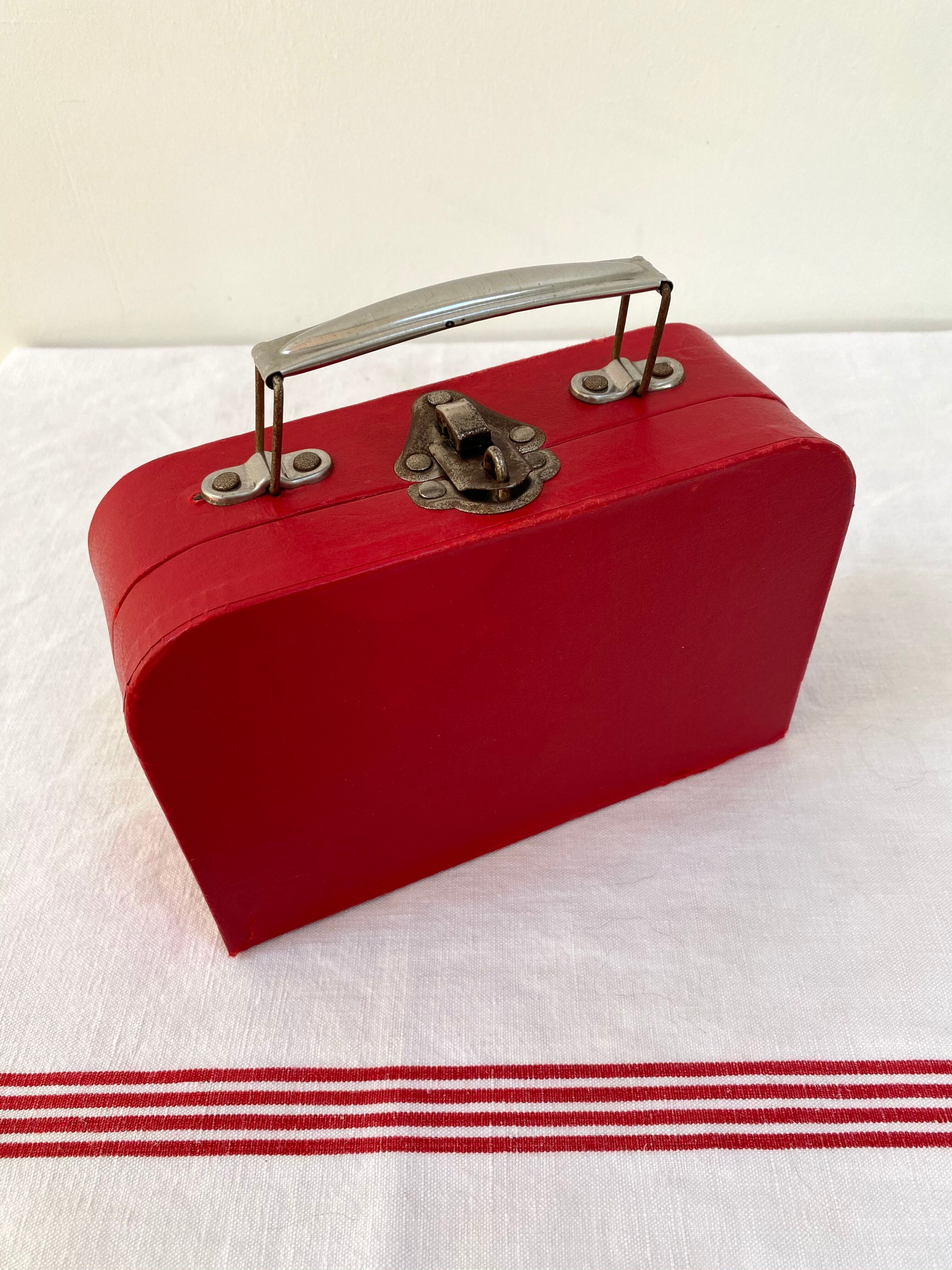 Red suitcase from the 60s