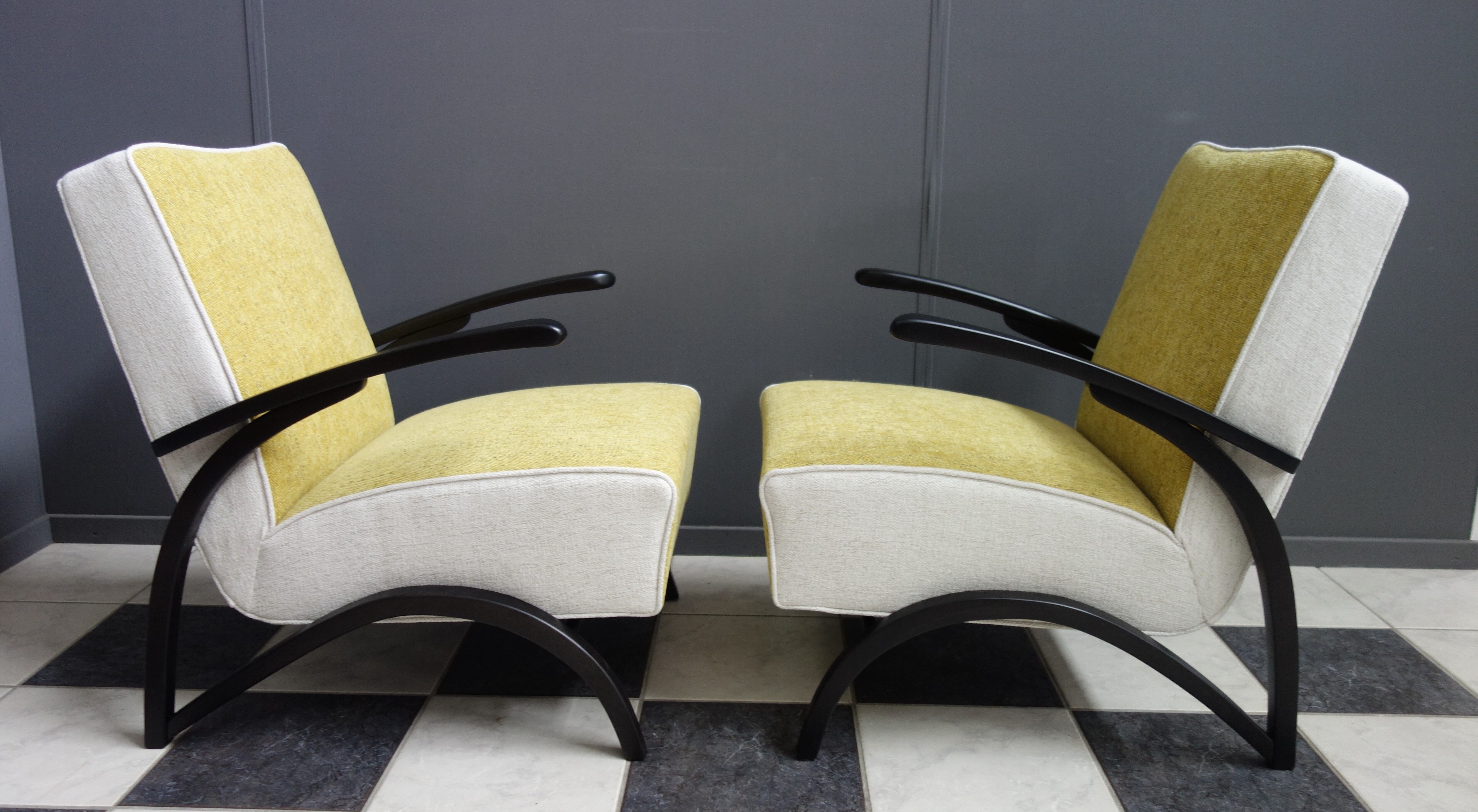 Jindrich halabala chairs yellow and white