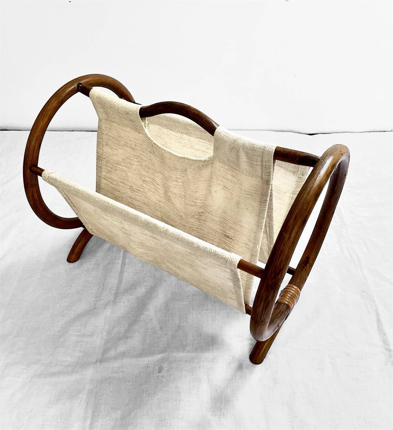 Vintage curved rattan magazine rack – 1960s