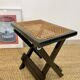 Tabouret pliable en cannage