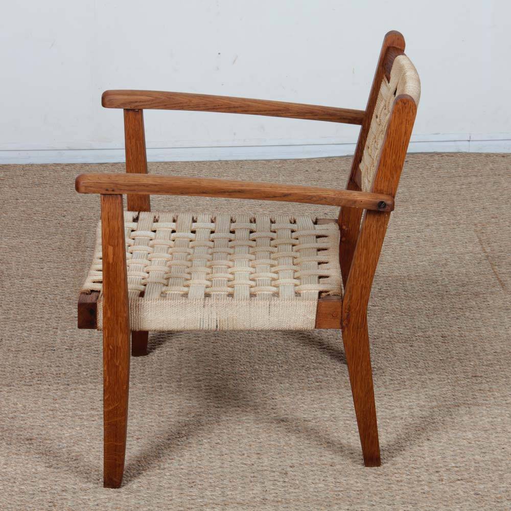 Armchair in solid oak and rope, 20th-century work.