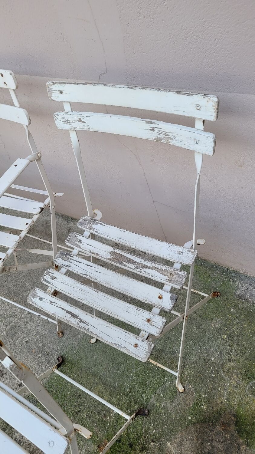 Series of 6 chairs and 1 folding armchair of iron garden bistro