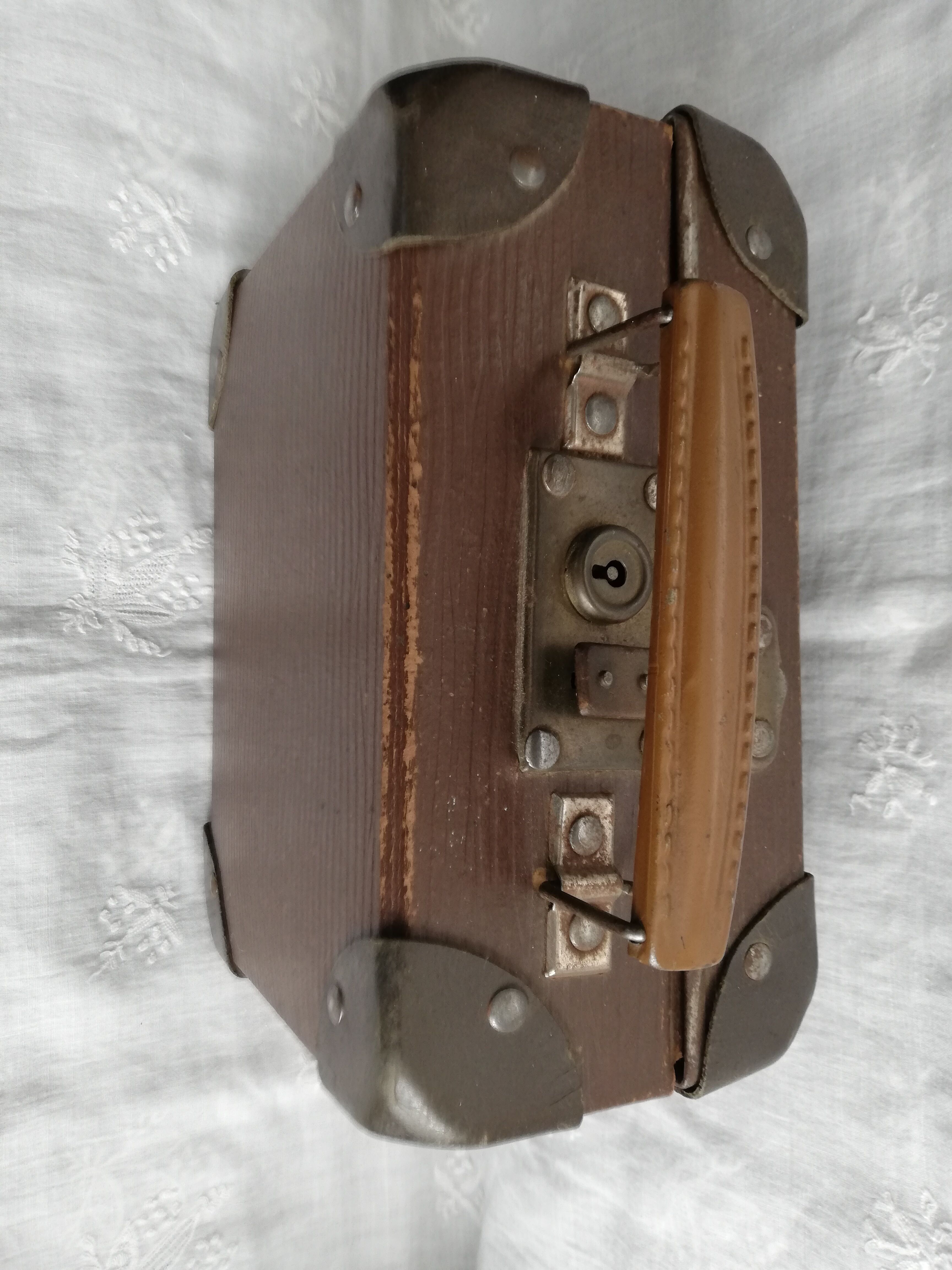 Old metal cardboard suitcase