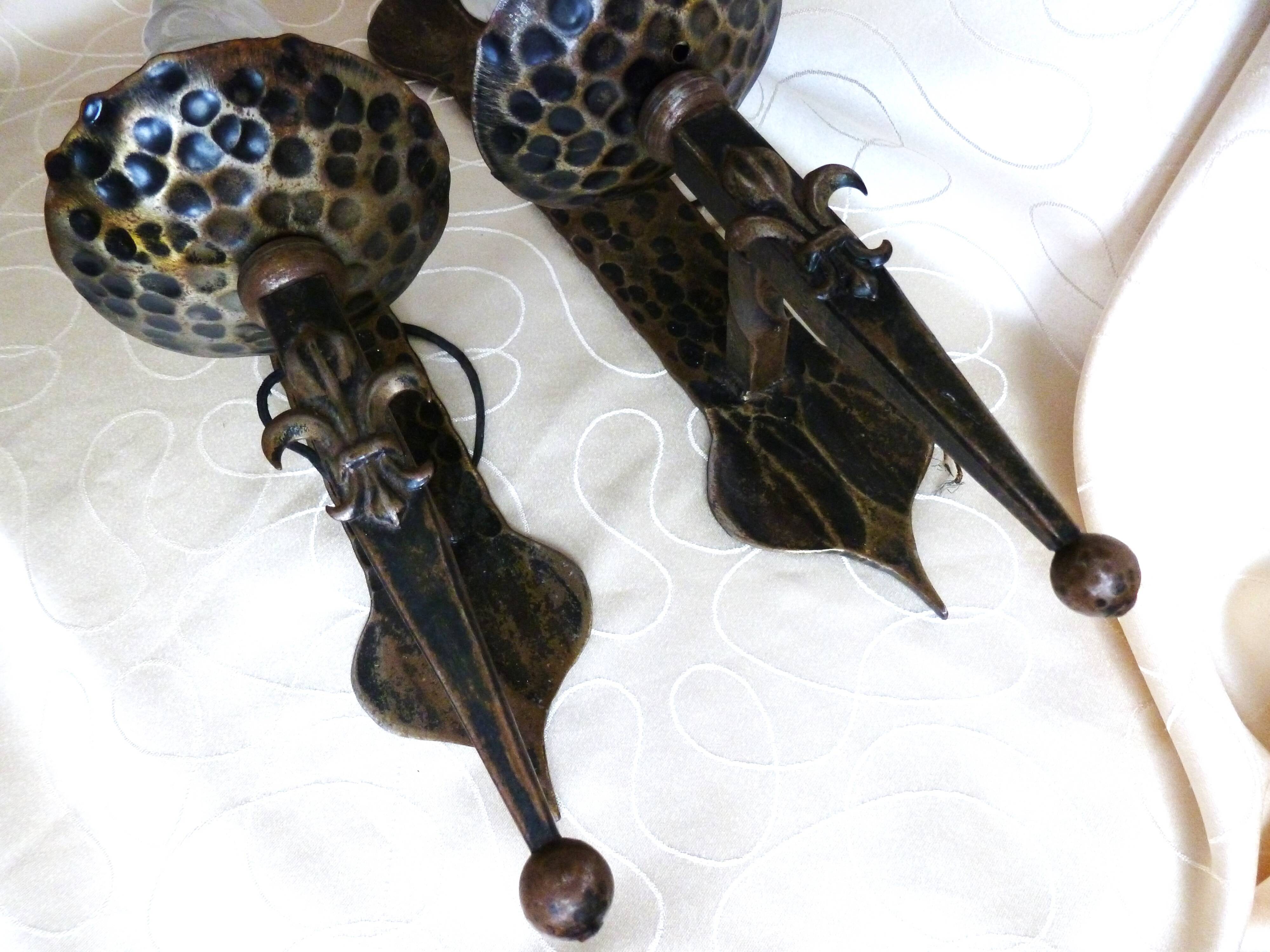 Medieval wrought iron wall lights / antique medieval lighting.