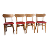 Set of 4 chairs in wood and red vinyl