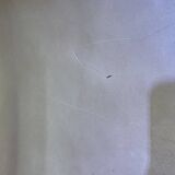 Colonial style leather armchair and ottoman