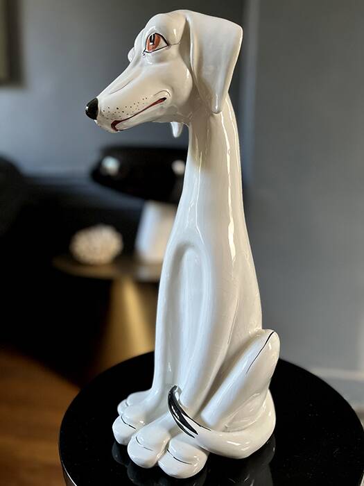 Enameled porcelain dog