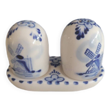 Mini salt and pepper shakers in ceramic with illustrations of Dutch windmills and blue flowers.