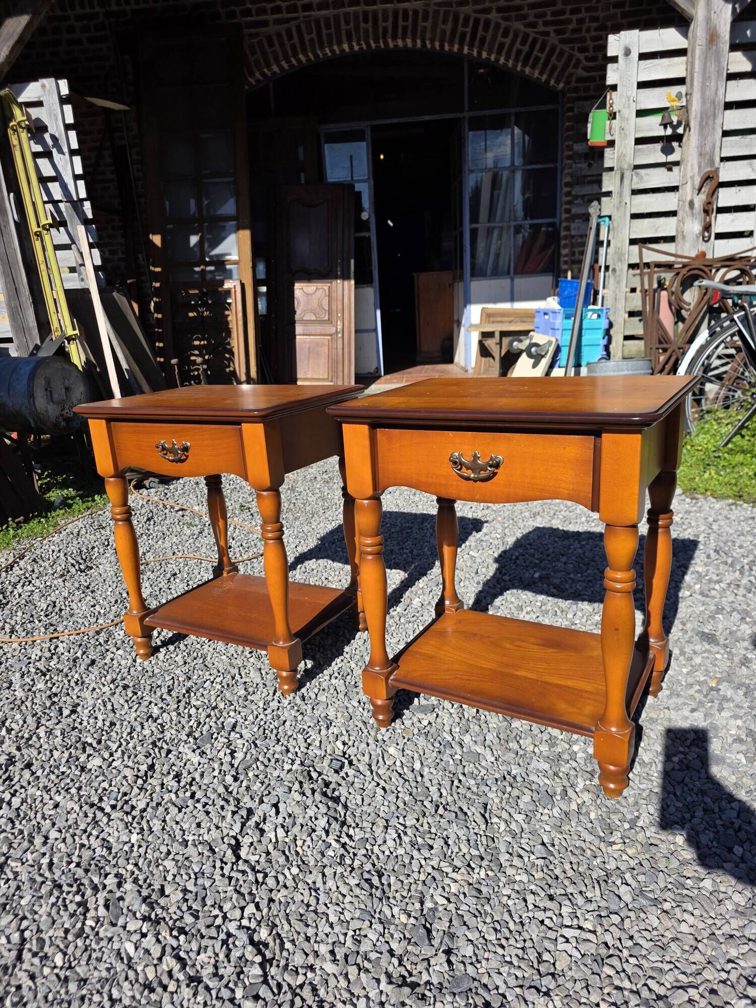Pair of cherry wood bedside tables from the mid-20th century.
