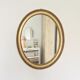 Miroir doré ovale vintage, 58x48 cm