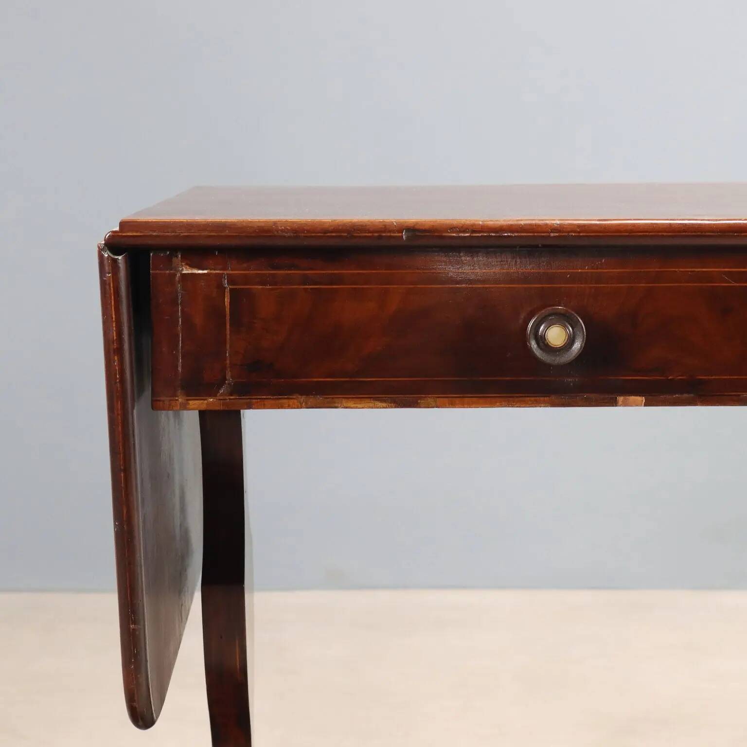 Antique mahogany desk with ebony and maple finishes, United Kingdom, 20th century.
