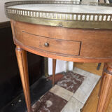 Bouillotte table with marble top in Louis XVI style.