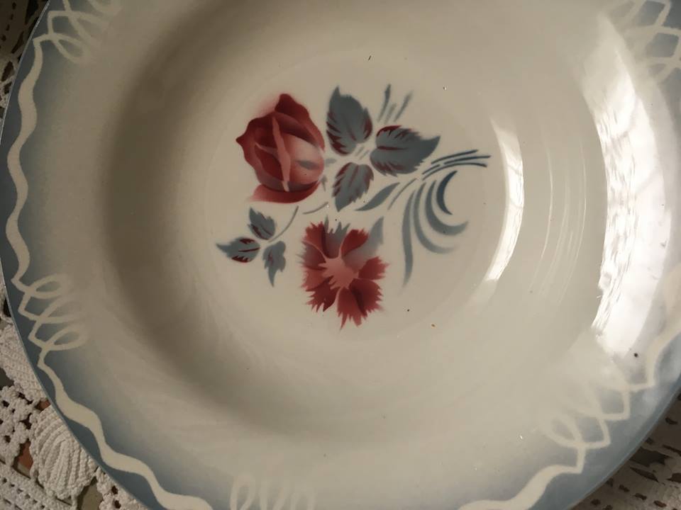 Six soup plates don't match in red and blue