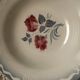 Six soup plates don't match in red and blue