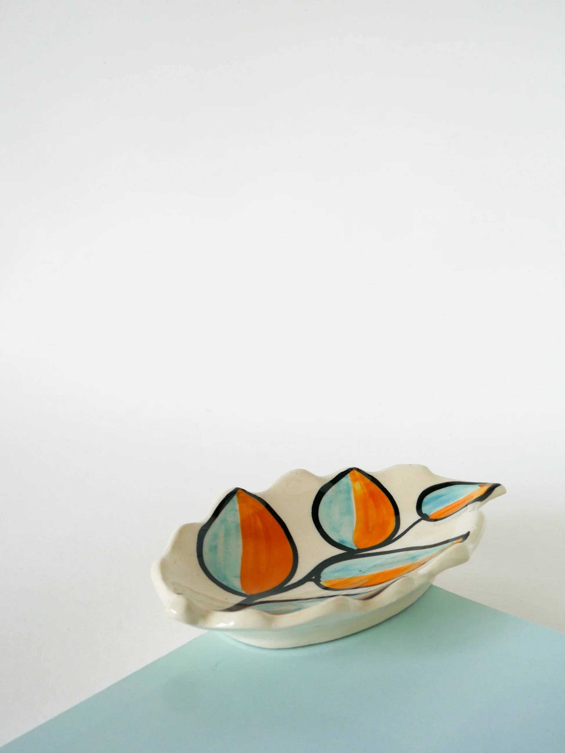 Ceramic catchall, leaf shape, orange and blue, psychedelic, 1970.