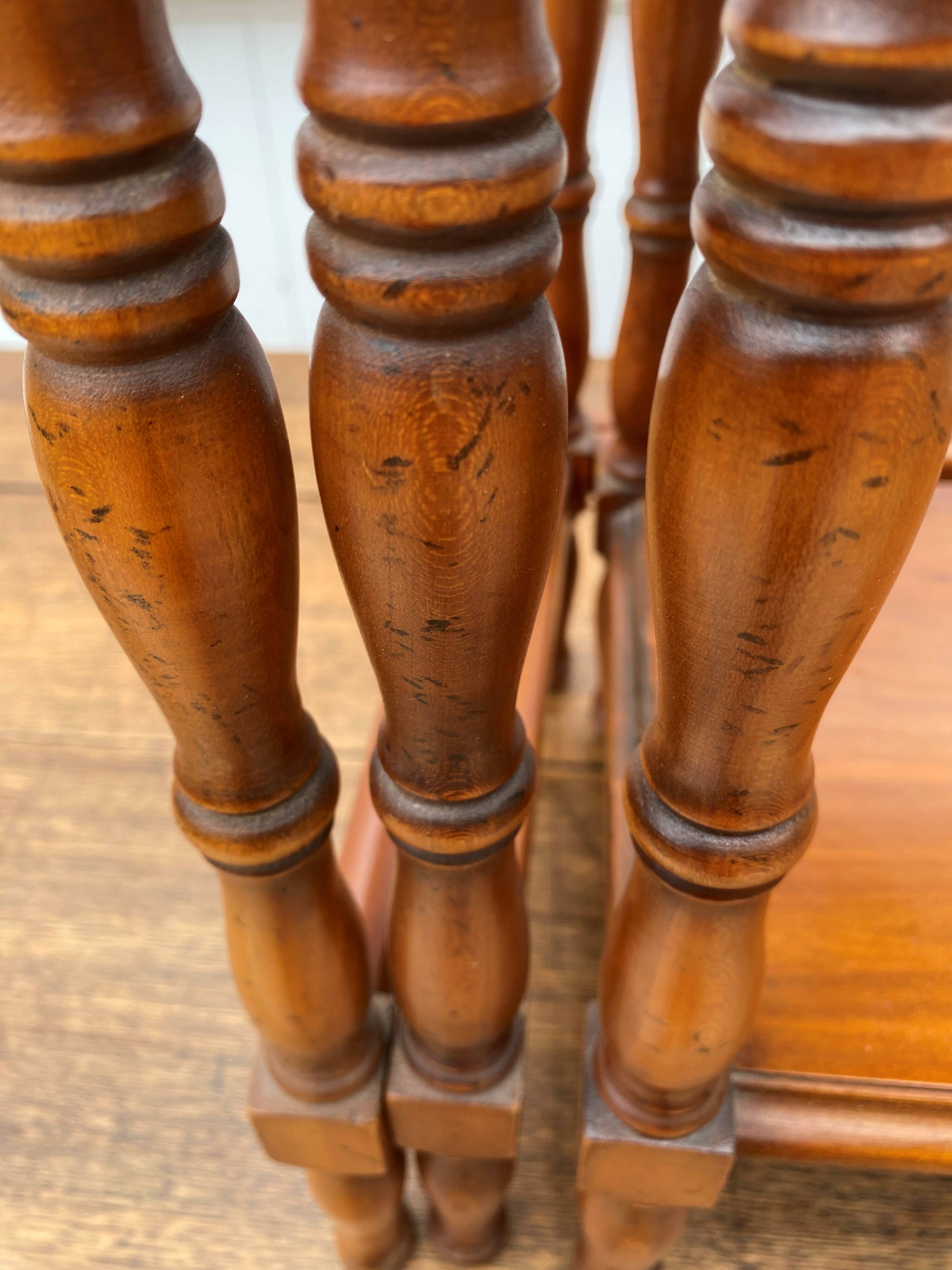 Set of 3 rustic cherry wood nesting coffee tables from the 1950s.