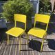 Pair of yellow plywood chairs