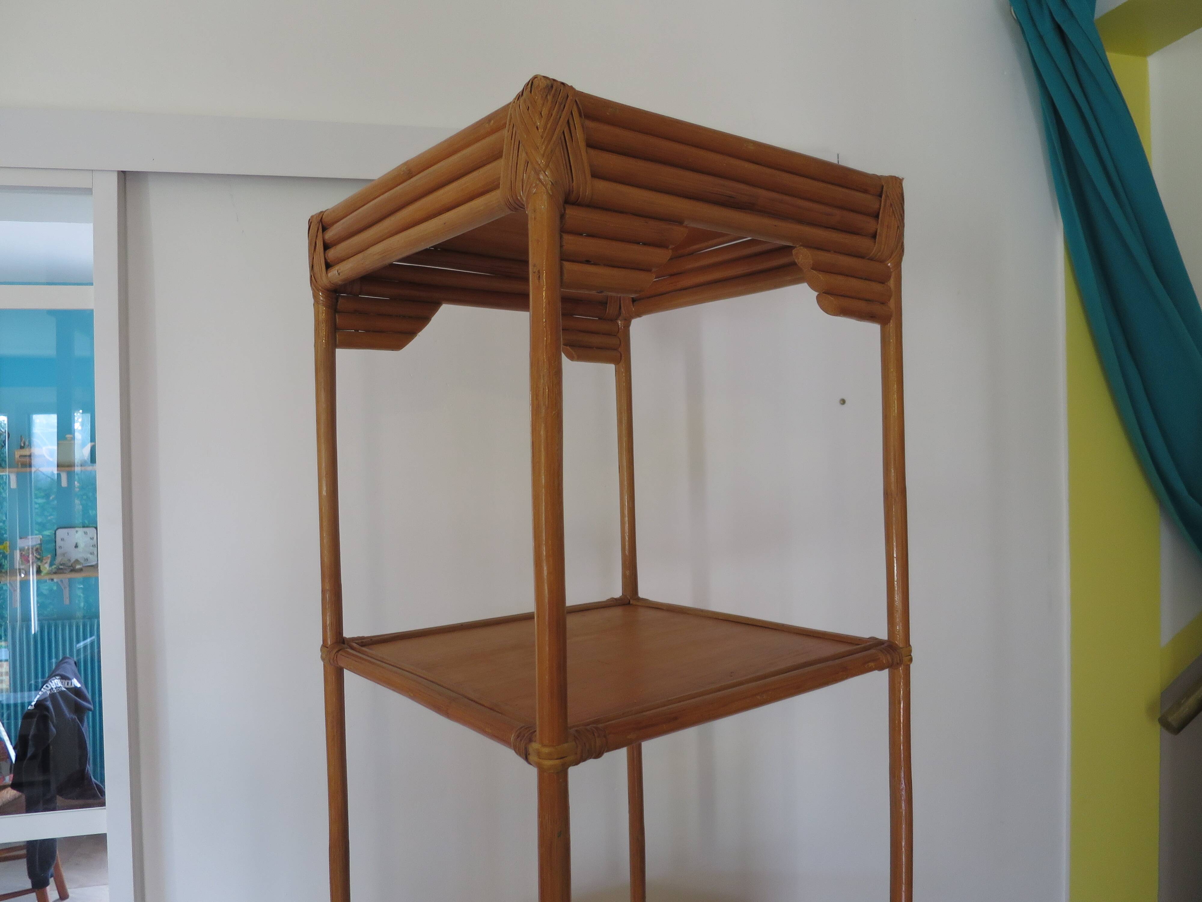Storage column, wooden bookshelf and woven rattan.