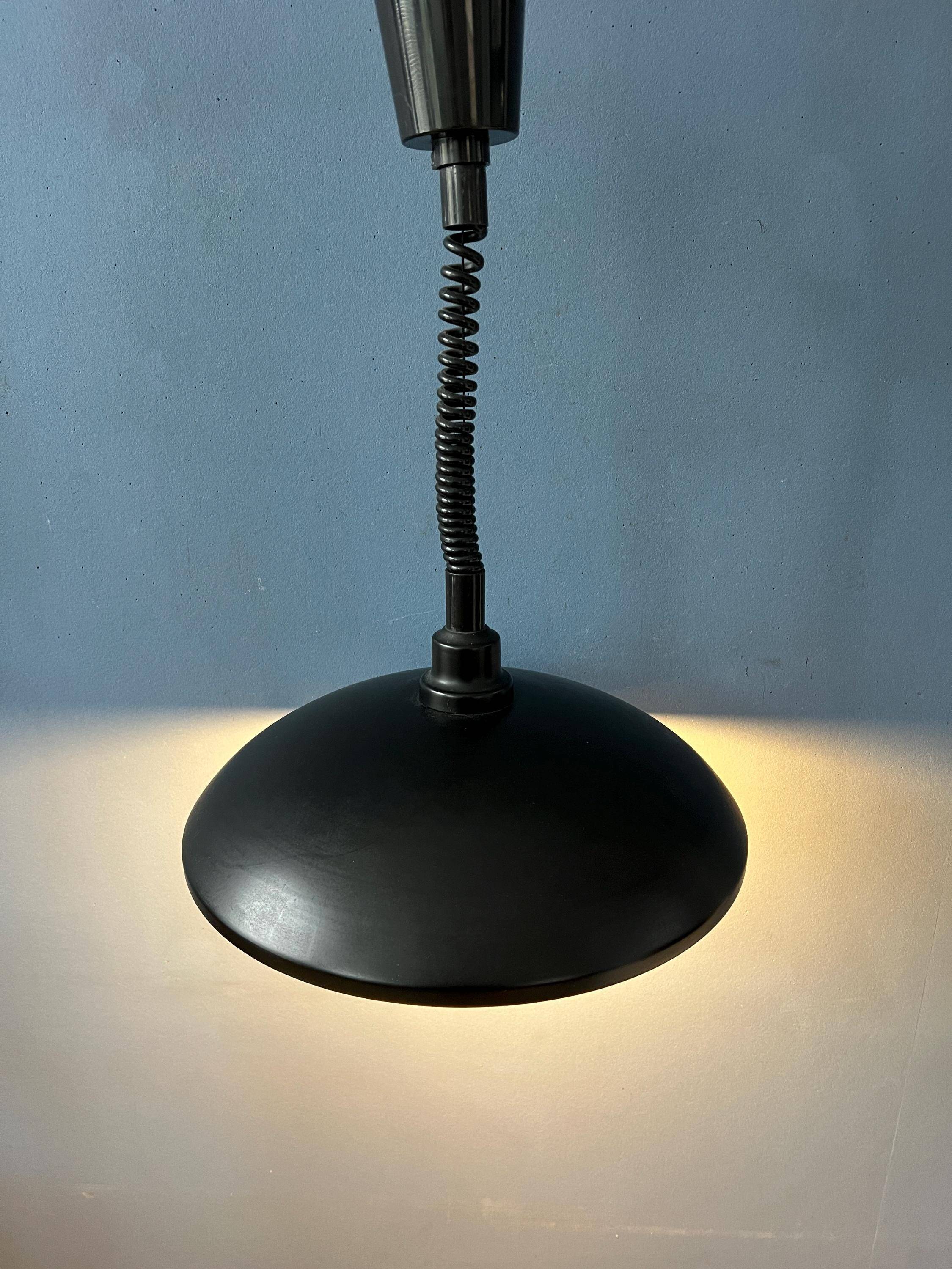 Black oval metal pendant Mid-Century