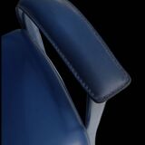 Armchairs covered in vintage blue leather