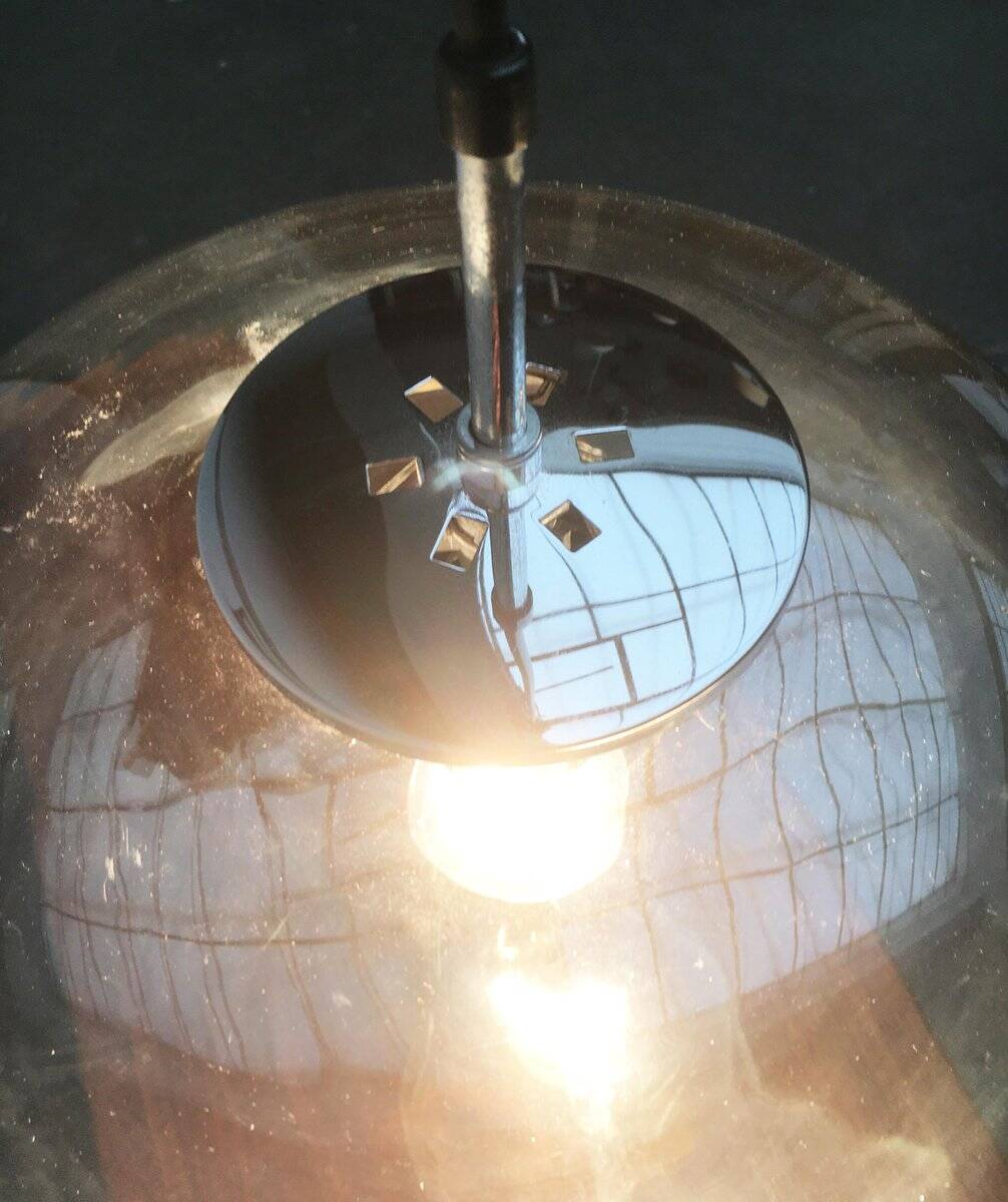 Suspended UFO-shaped glass luminaires in mid-century German Space Age style, set of 3.