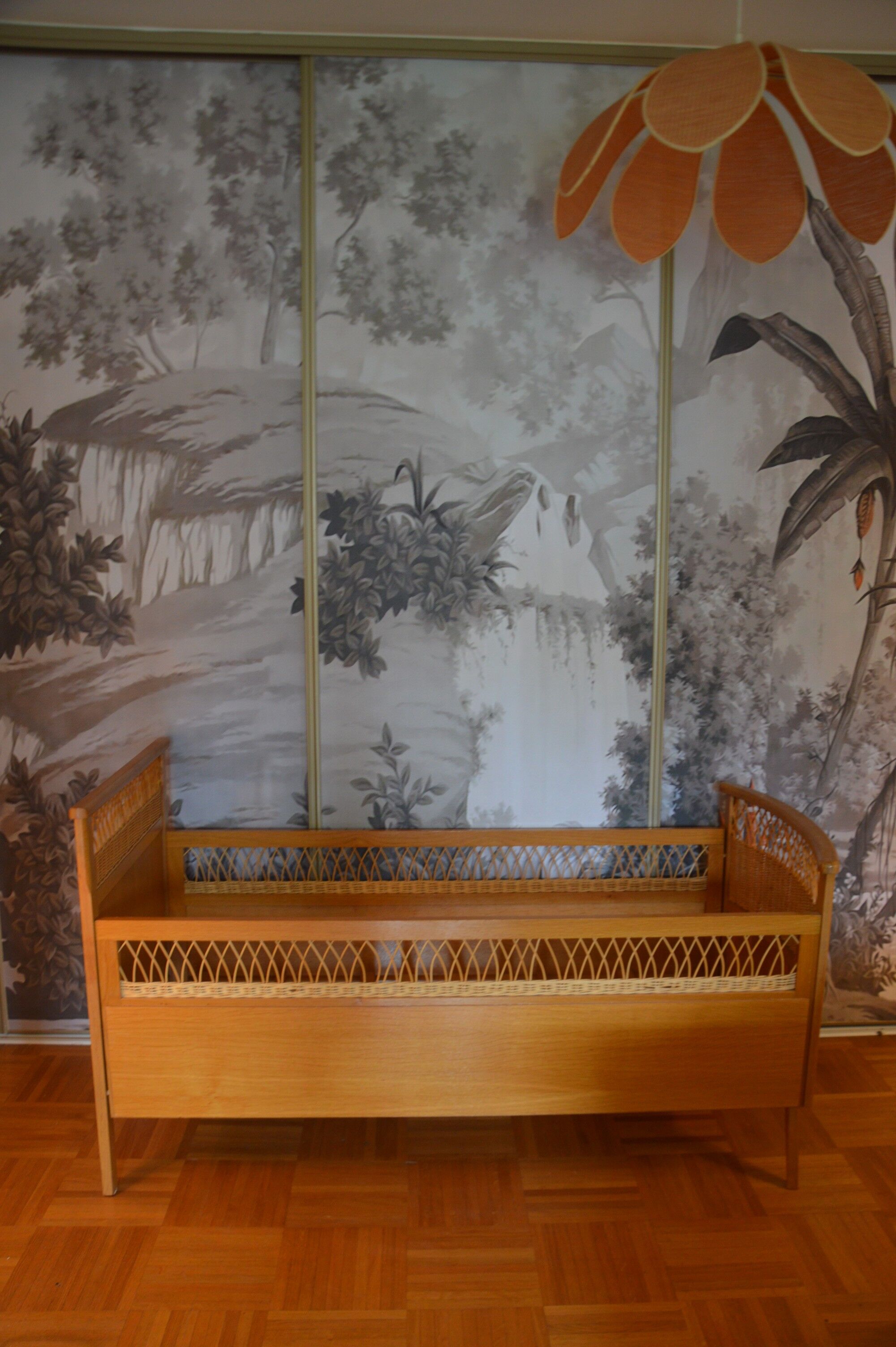 Child's bed in rattan of the years 50