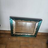 Turquoise green mirror in Hollywood Regency style