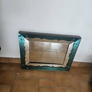 Turquoise green mirror in Hollywood Regency style