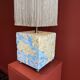 Base stuck blue beige marble-plaster, fringed lampshade Houles, 21st century.