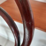 pair of round bistro chairs with a pattern on the seat, vintage