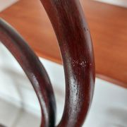 pair of round bistro chairs with a pattern on the seat, vintage
