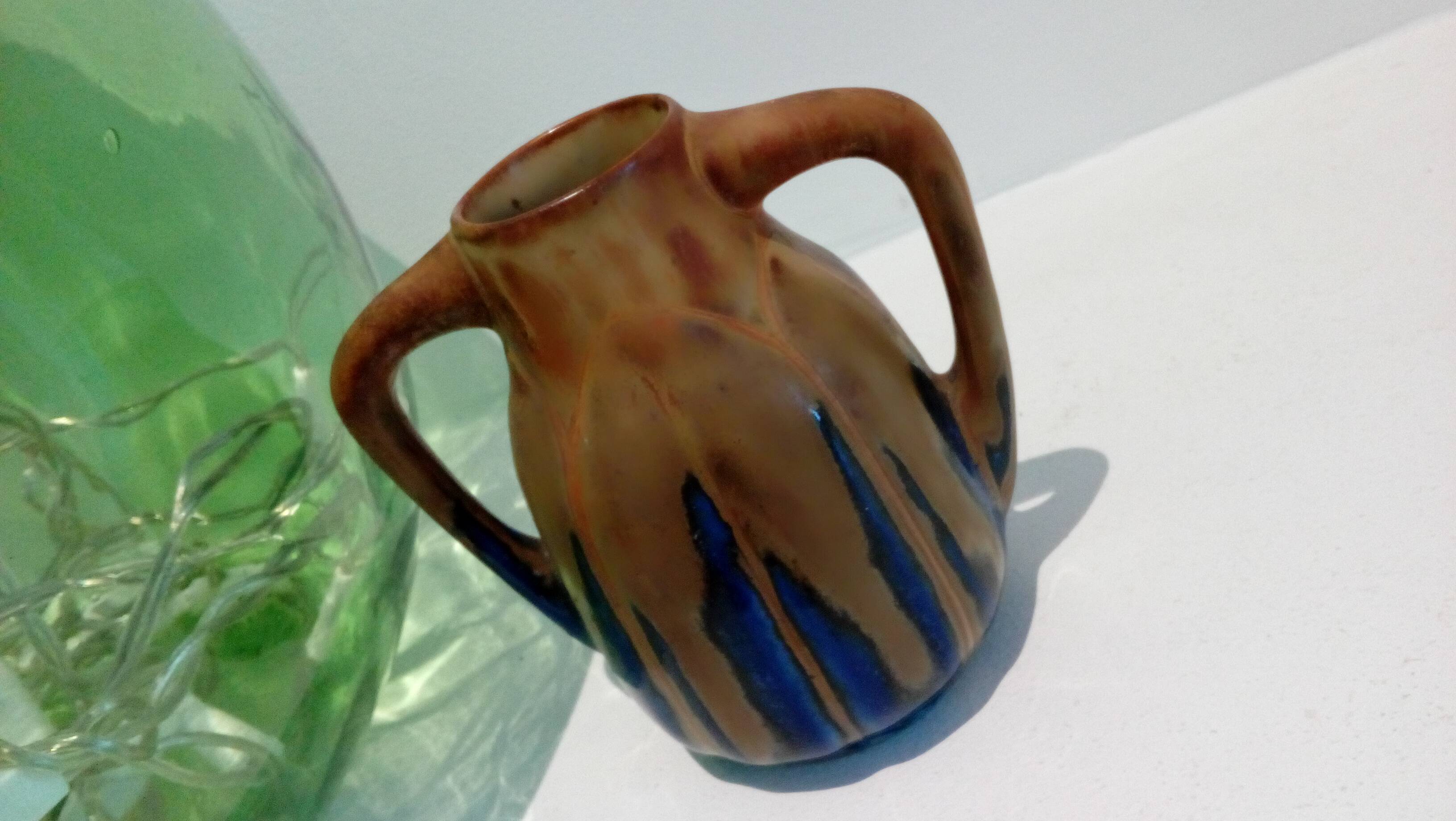 Blue enamelled flamed sandstone vase by Méténier