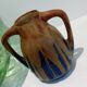Blue enamelled flamed sandstone vase by Méténier