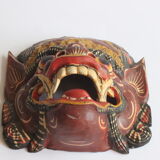 Two polychrome painted and gold leaf gilded Barong dance masks from Bali, Indonesia.
