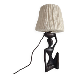 Ebony lamp with seated woman / 1930s