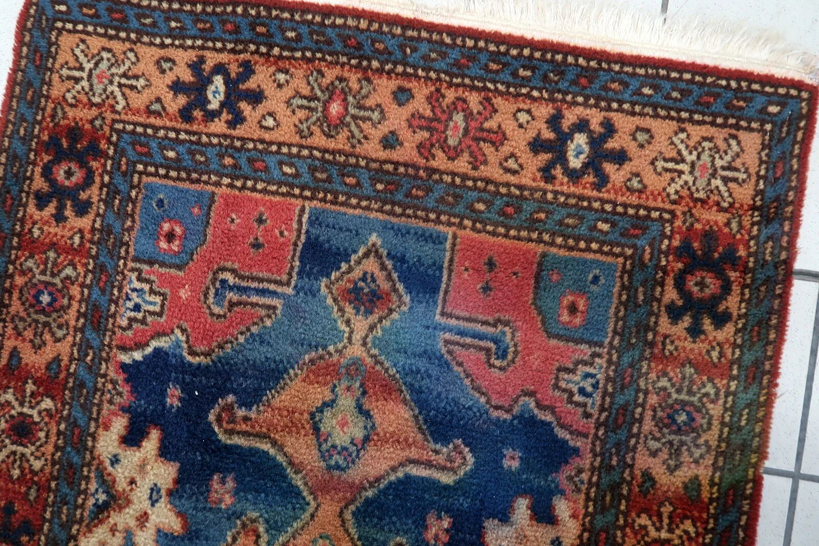 Vintage 1950s German tribal style wool rug, geometric medallion, 84cm x 180cm