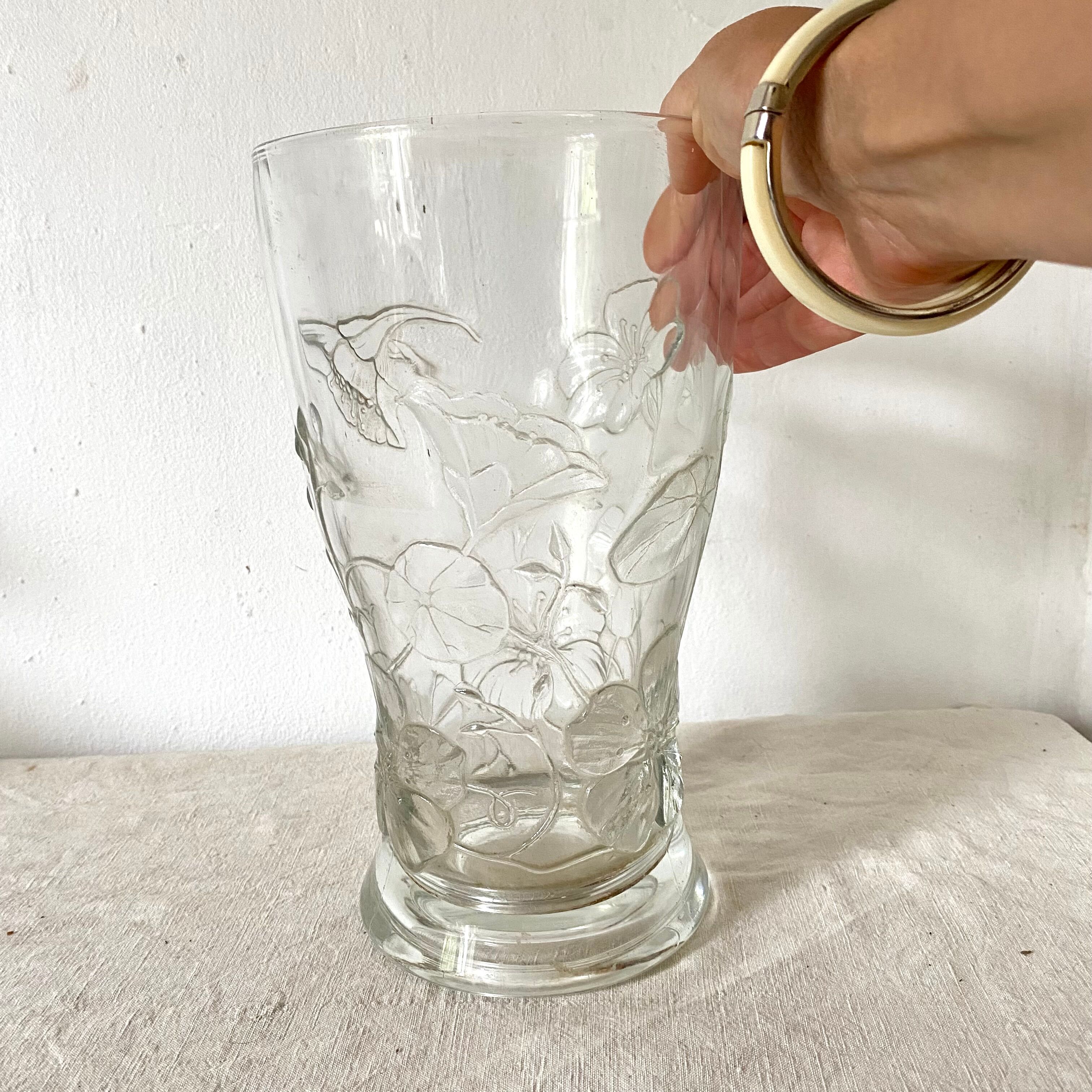 Antique glass vase with embossed nasturtiums