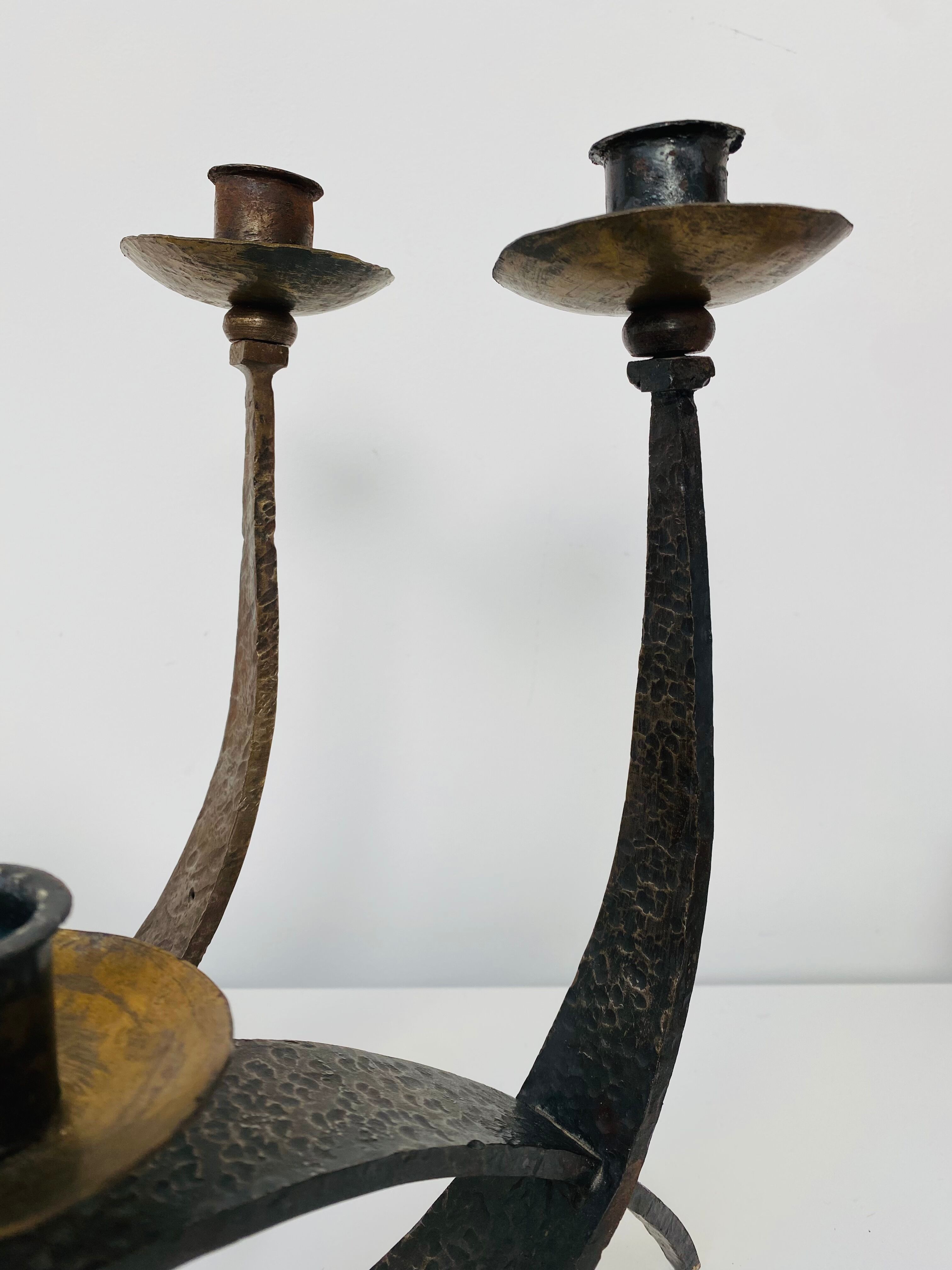 Hammered steel candle holder