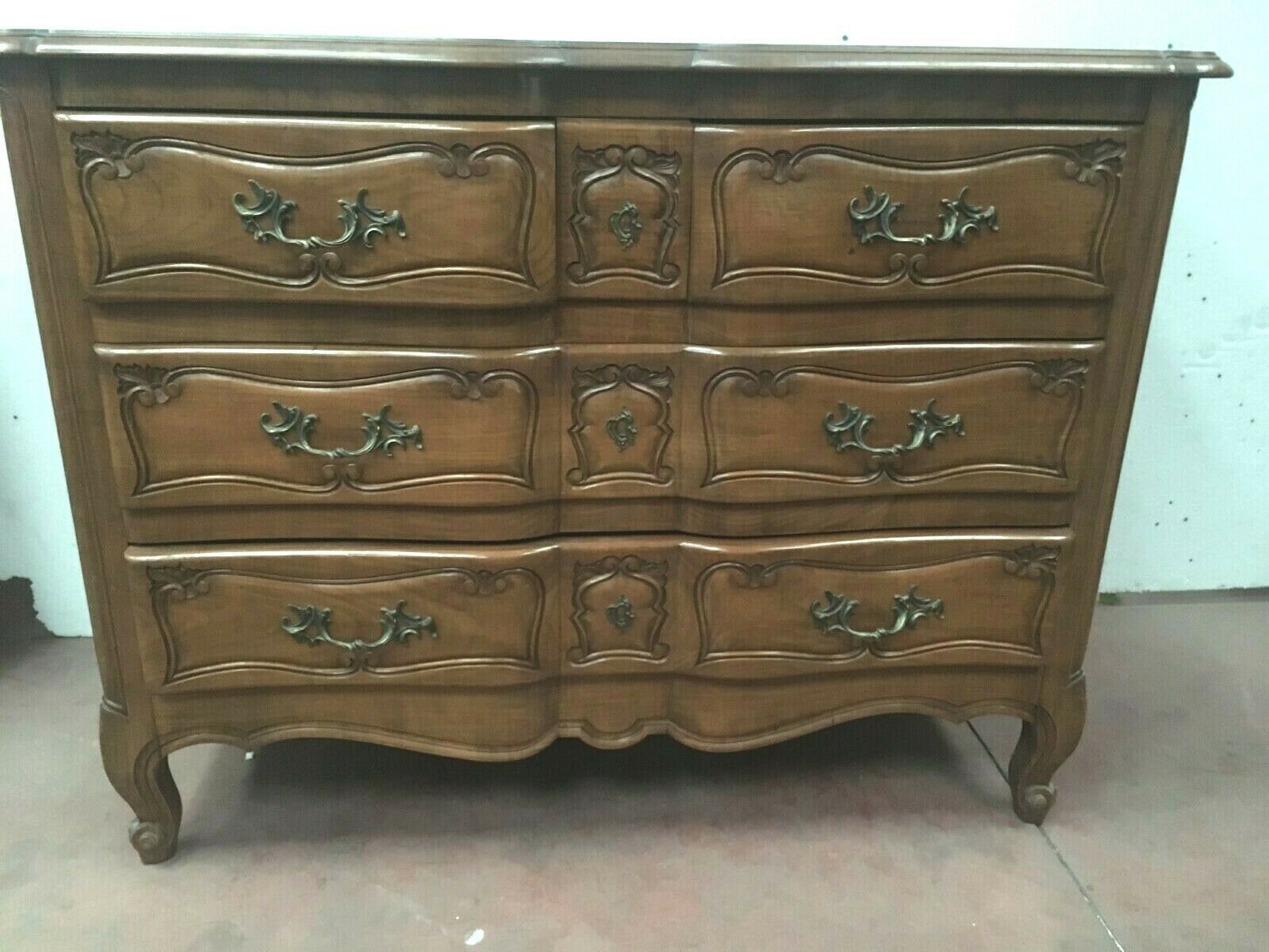 Three walnut drawers chest