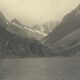 Photo in black and white mountain lake in golden frame