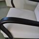 Ivory Art Deco armchair in fabric and dark wood, high back, 1920s-1930s.