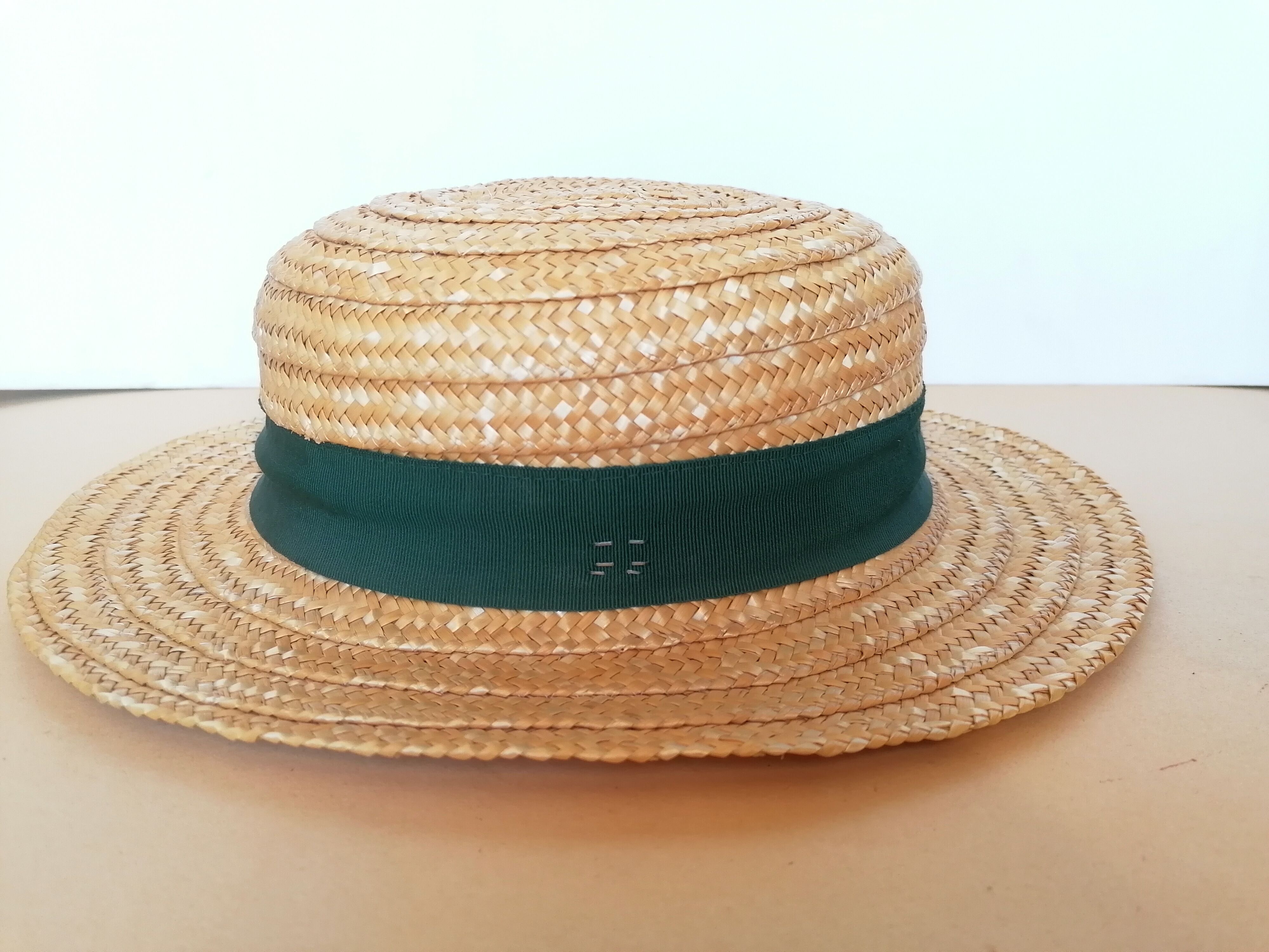 Canoe hat made of woven straw