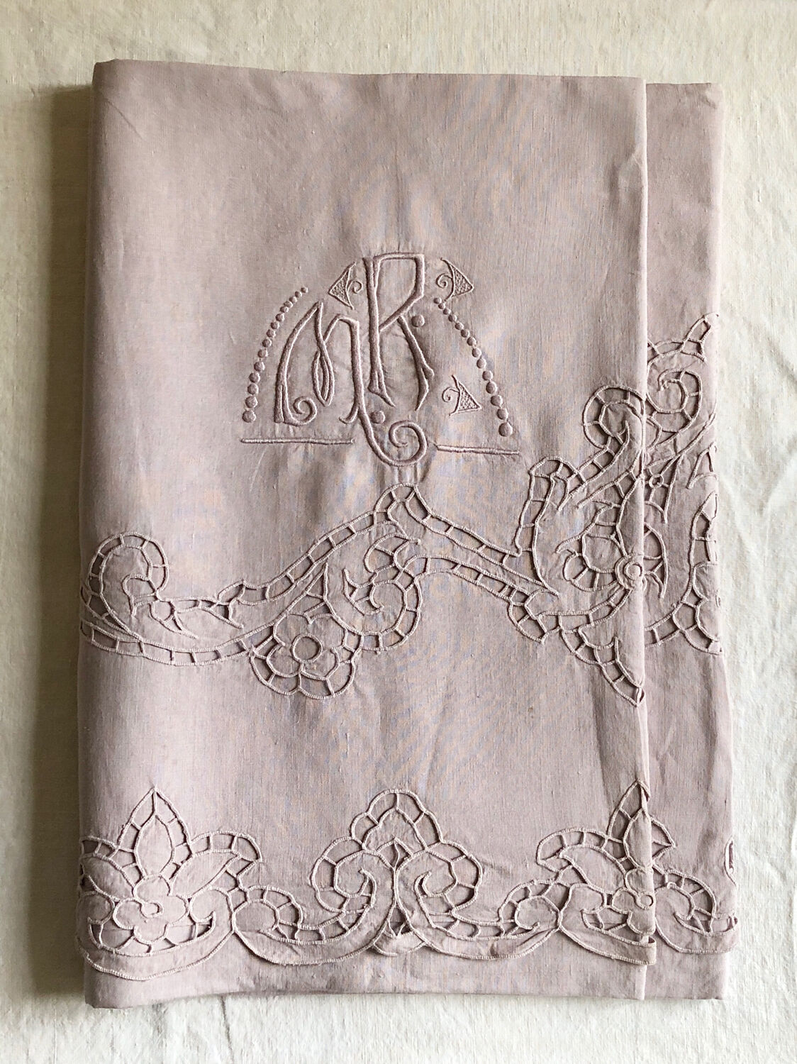 Old embroidered towel tinted purple aurora