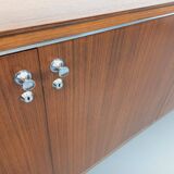 Vintage modernist enfilade in rosewood and chrome metal from the 60s and 70s.