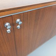 Vintage modernist enfilade in rosewood and chrome metal from the 60s and 70s.