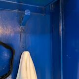 Metal locker with metal rivets