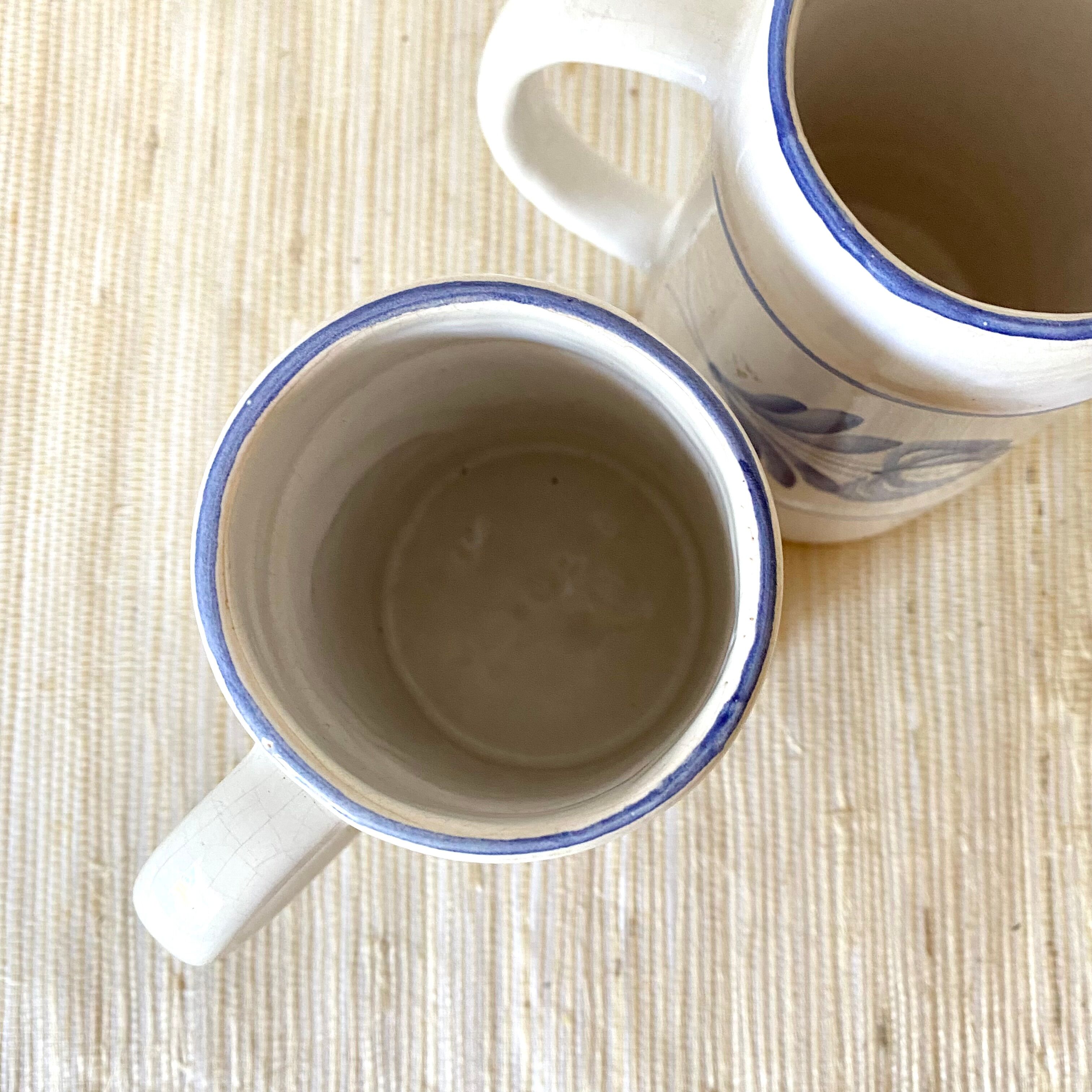 Flowery earthenware beer mugs